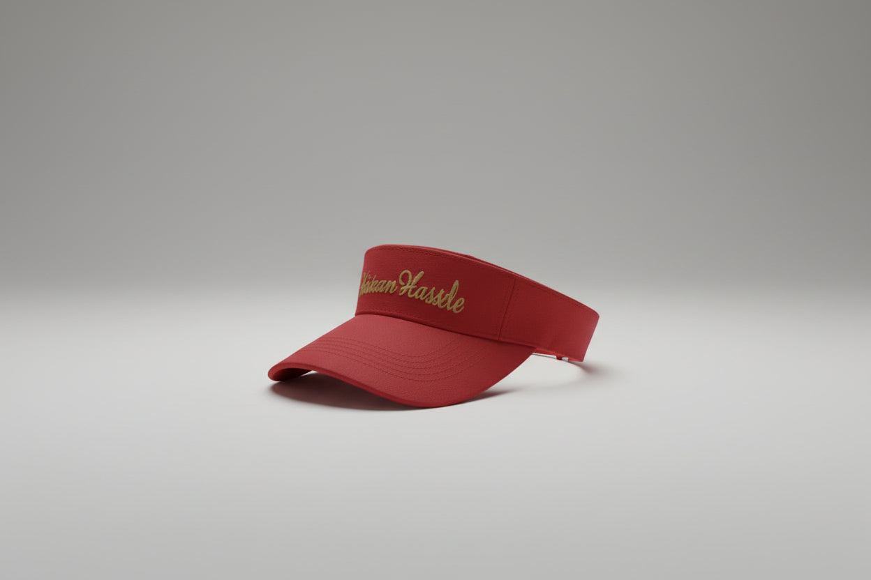 Red cap with 'Maximum Hustle' text on a white background
