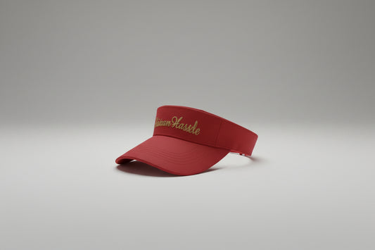 Red cap with 'Maximum Hustle' text on a white background